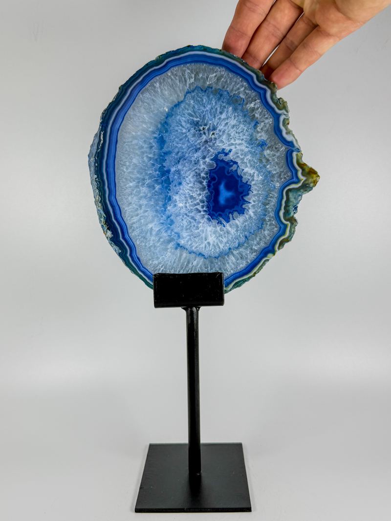 Blauwe agaatschijf met heldere buitenrand